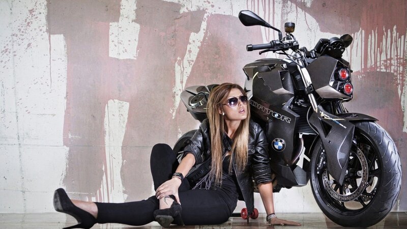 Woman Sitting with Motorcycle — Black, Dramatic, Photograph