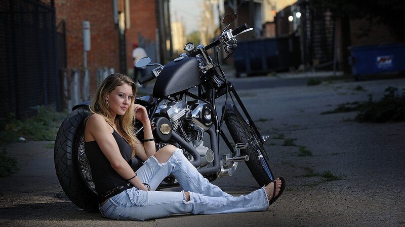Woman Sitting with Motorcycle — Black, Dramatic