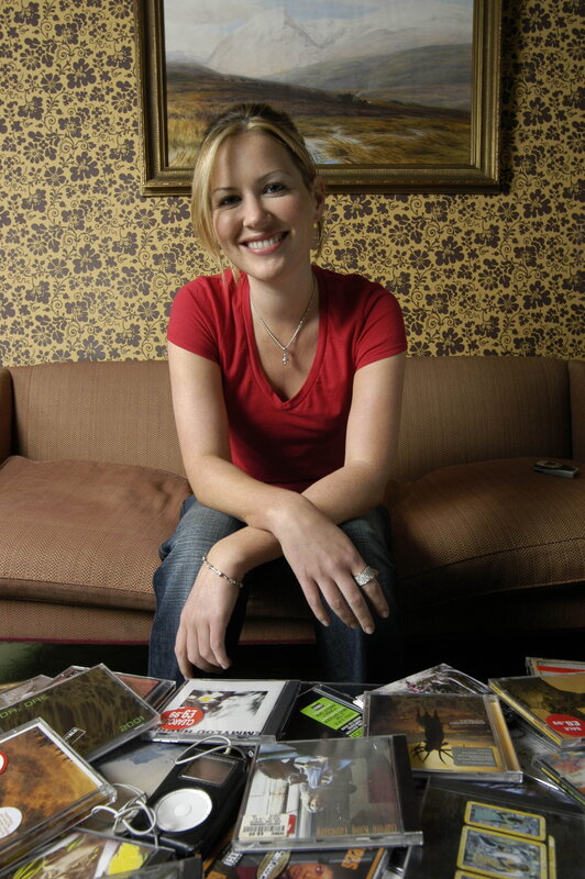 woman sitting with music collection