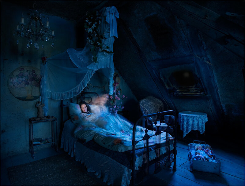woman sleeping in attic room