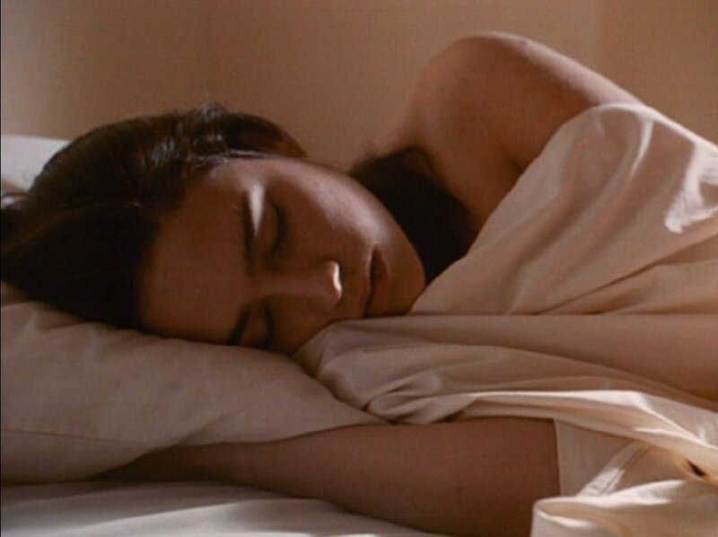 woman sleeping in bed