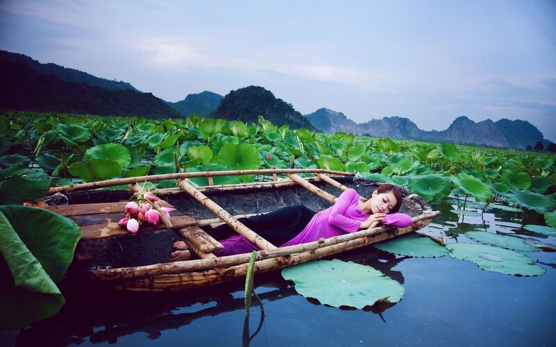 Woman Sleeping in Boat