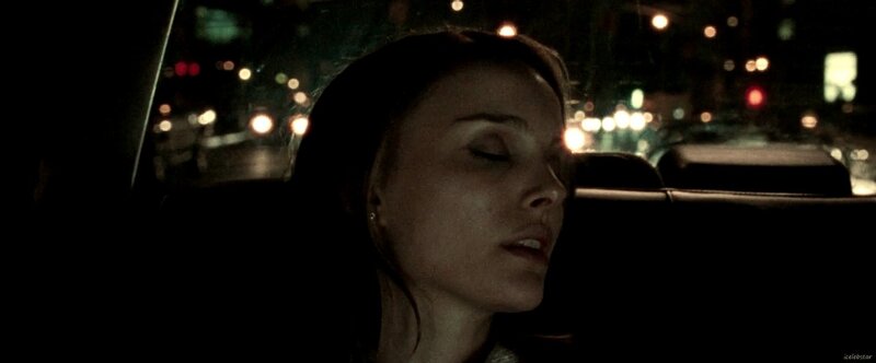 woman sleeping in car at night