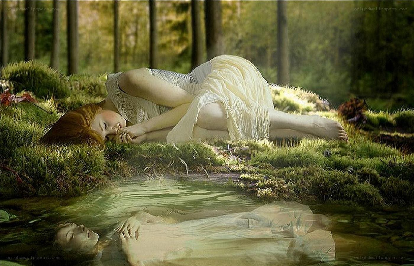 Woman sleeping in forest