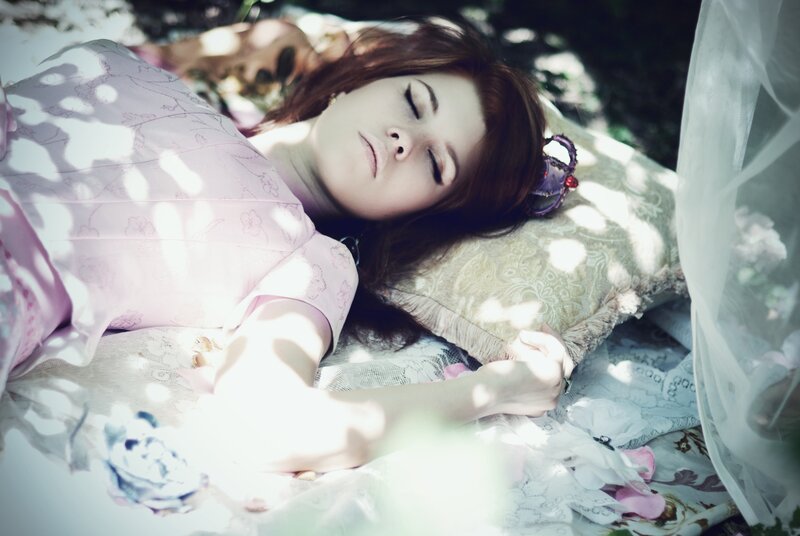 woman sleeping in garden