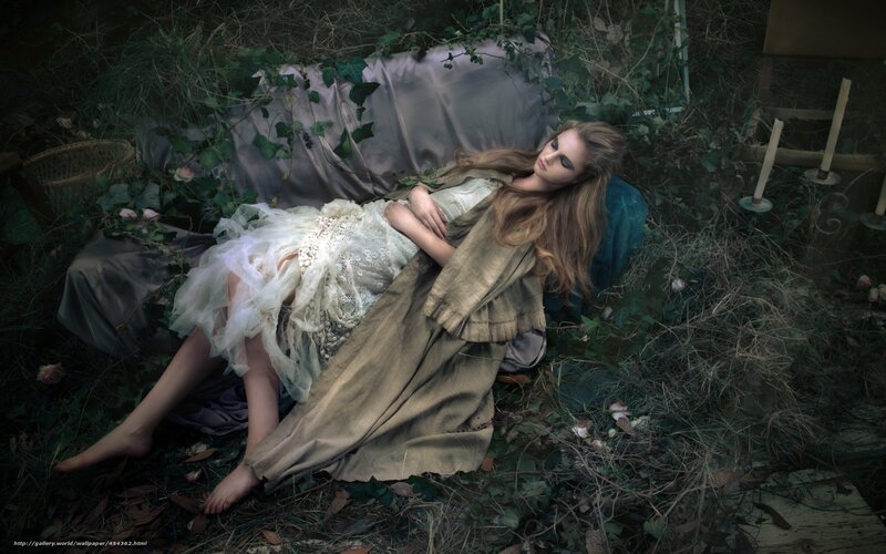 woman sleeping in overgrown garden