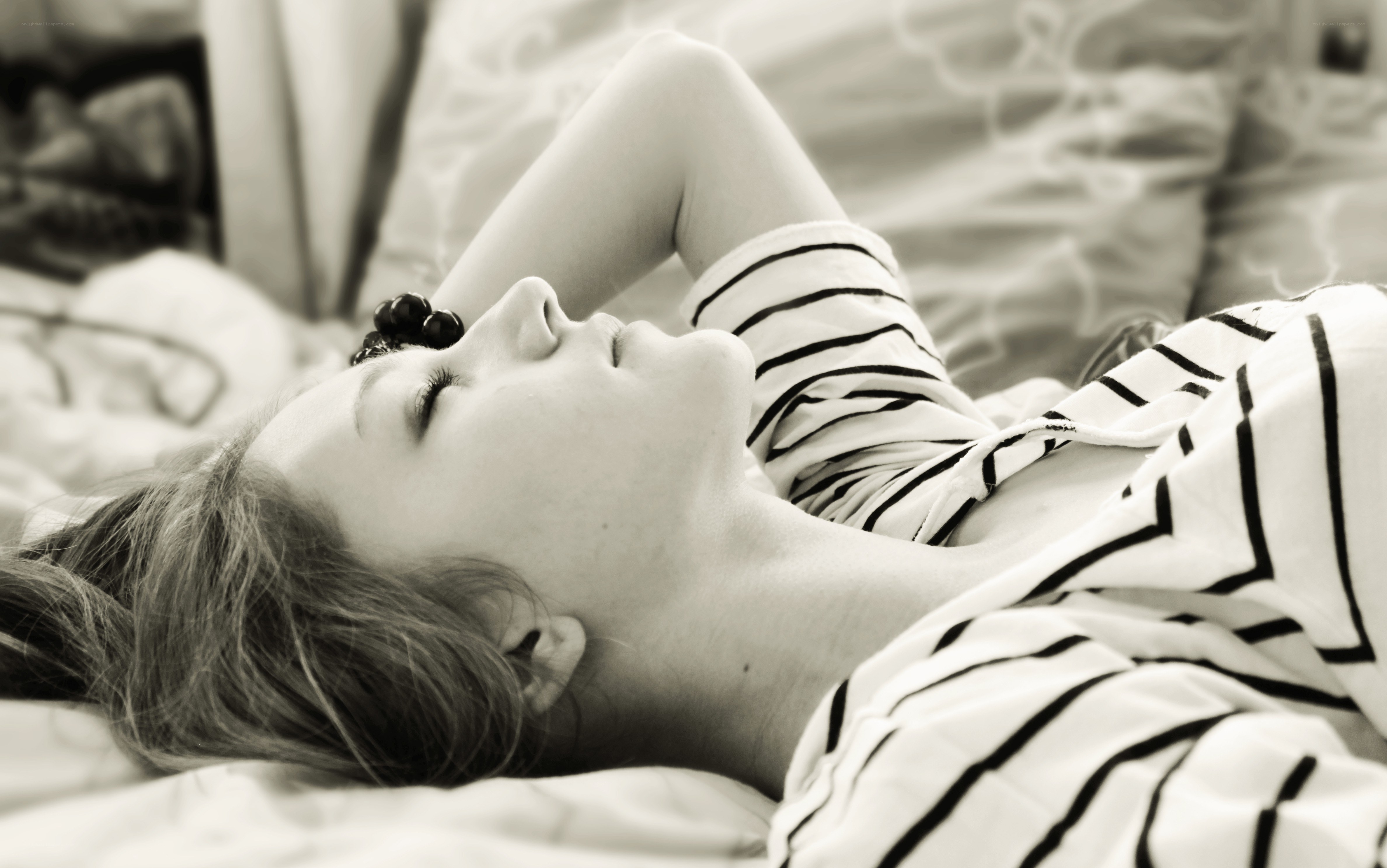 woman sleeping on bed