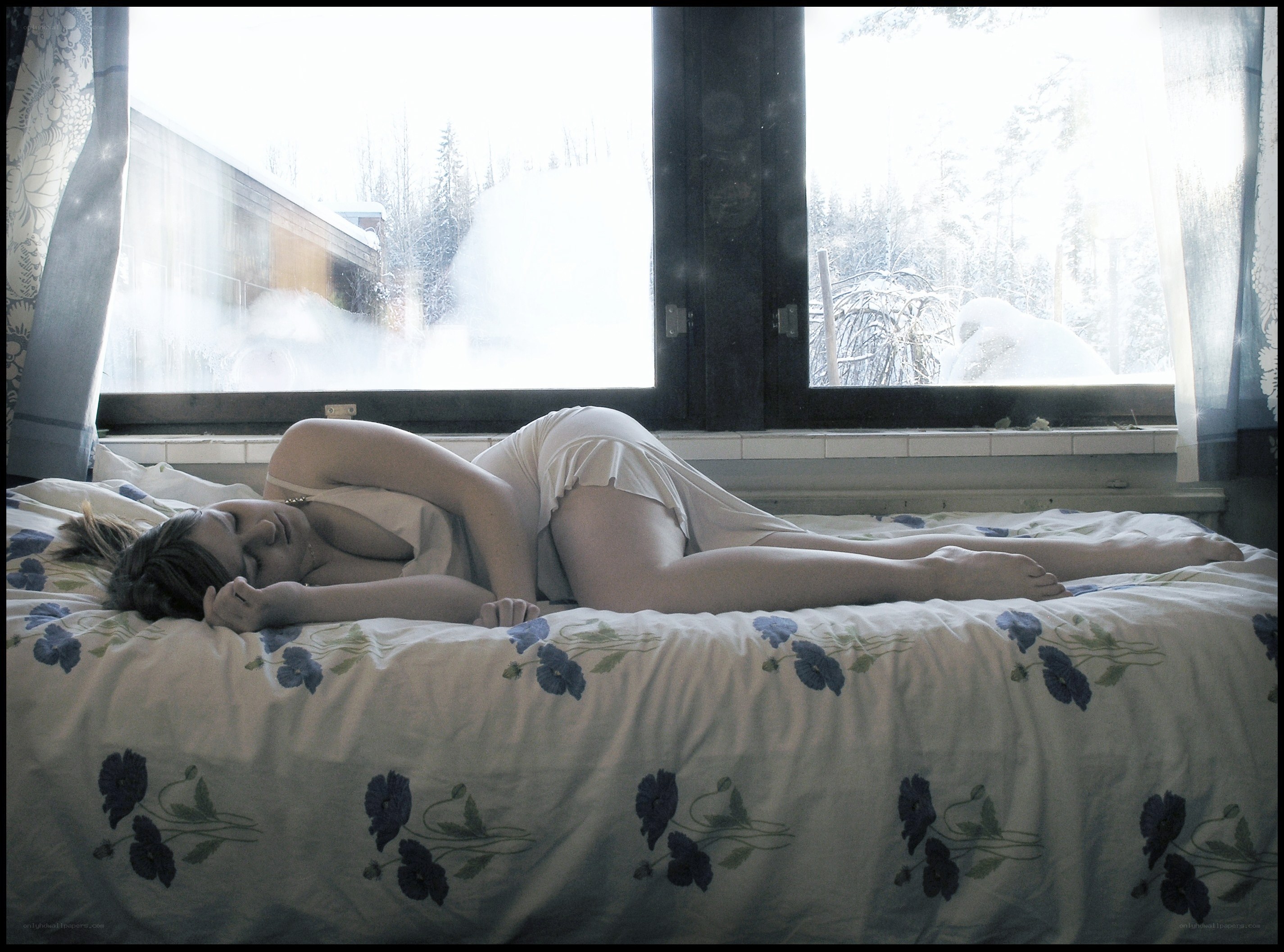 Woman sleeping on bed