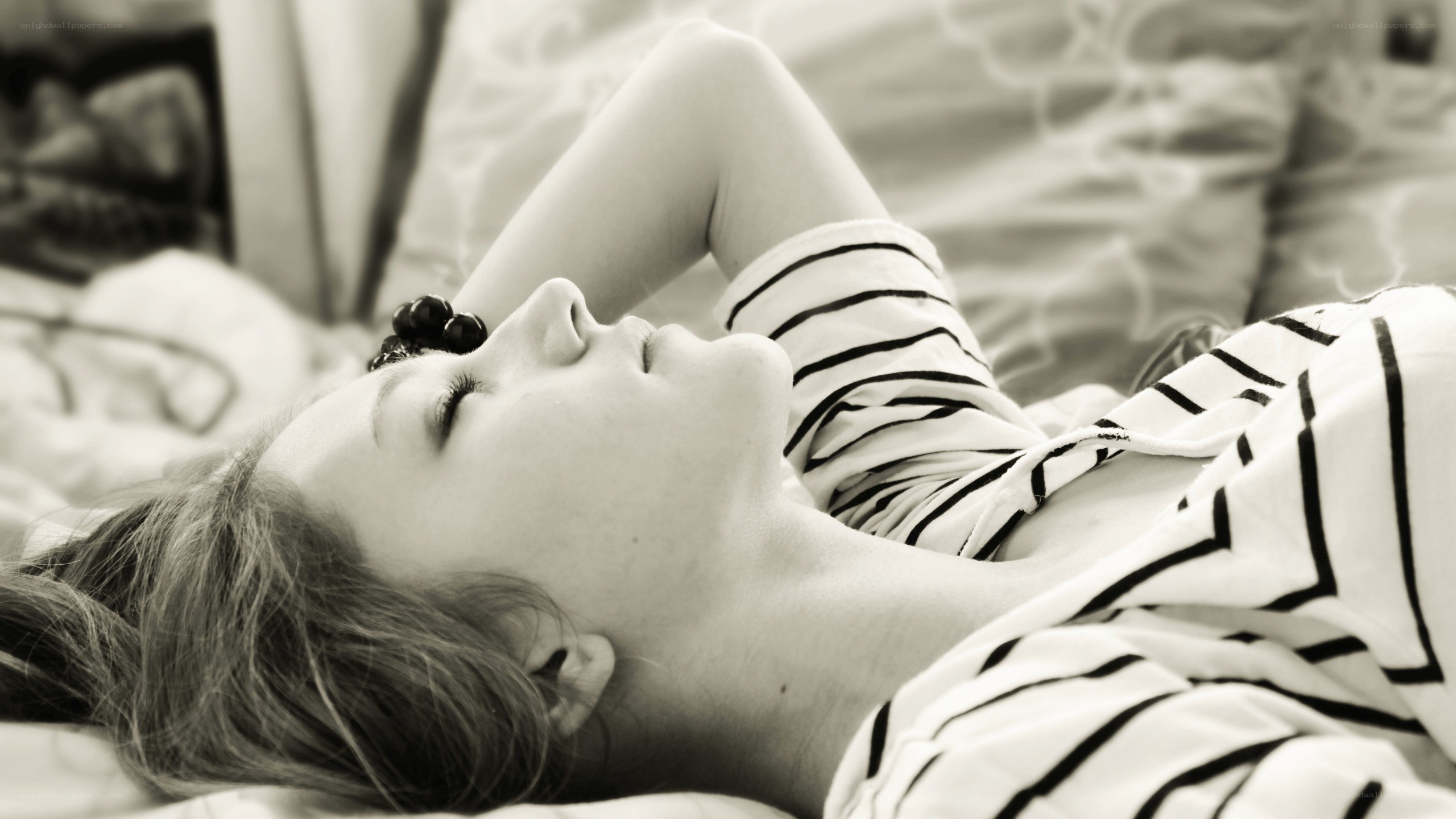woman sleeping on bed