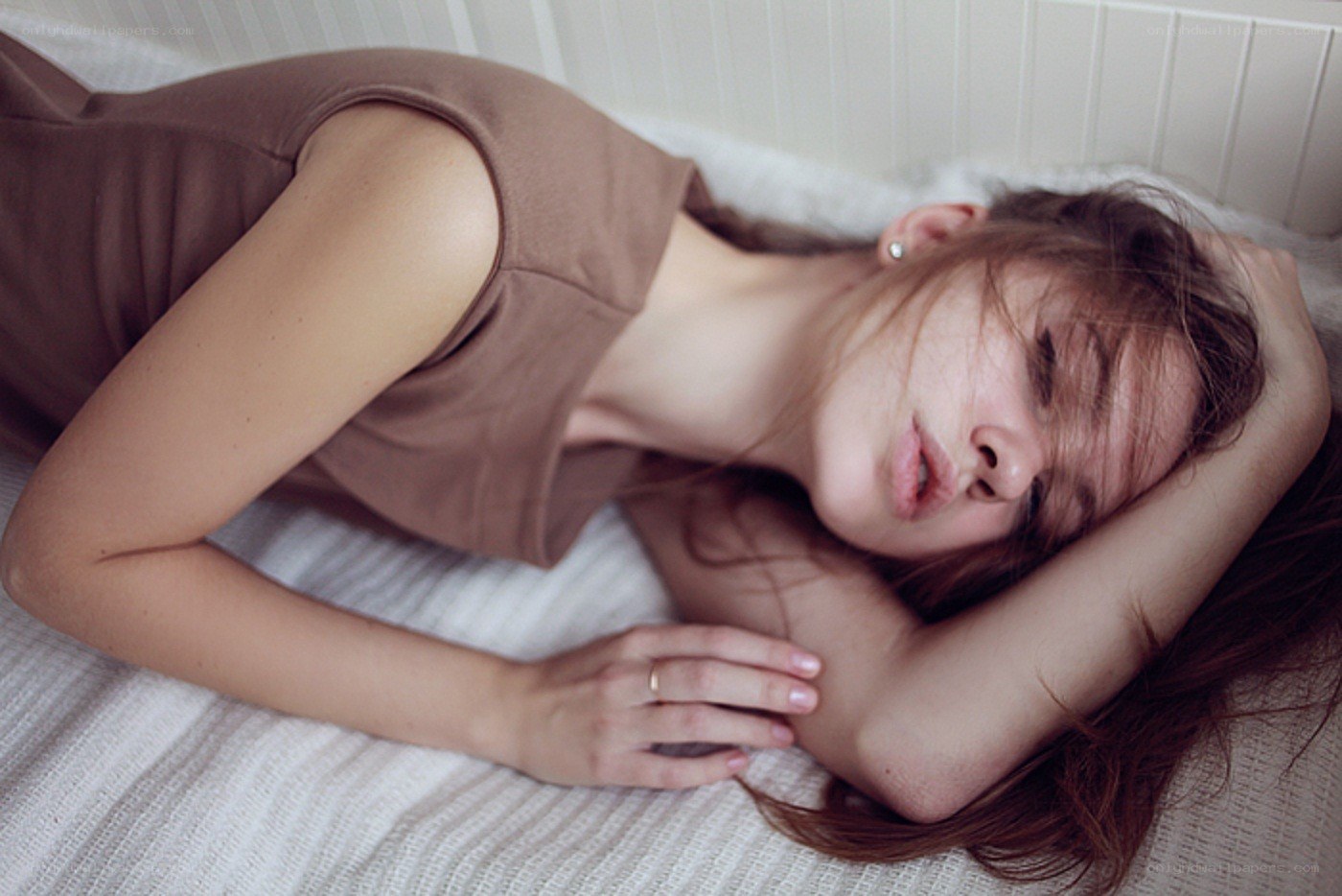 woman sleeping on bed