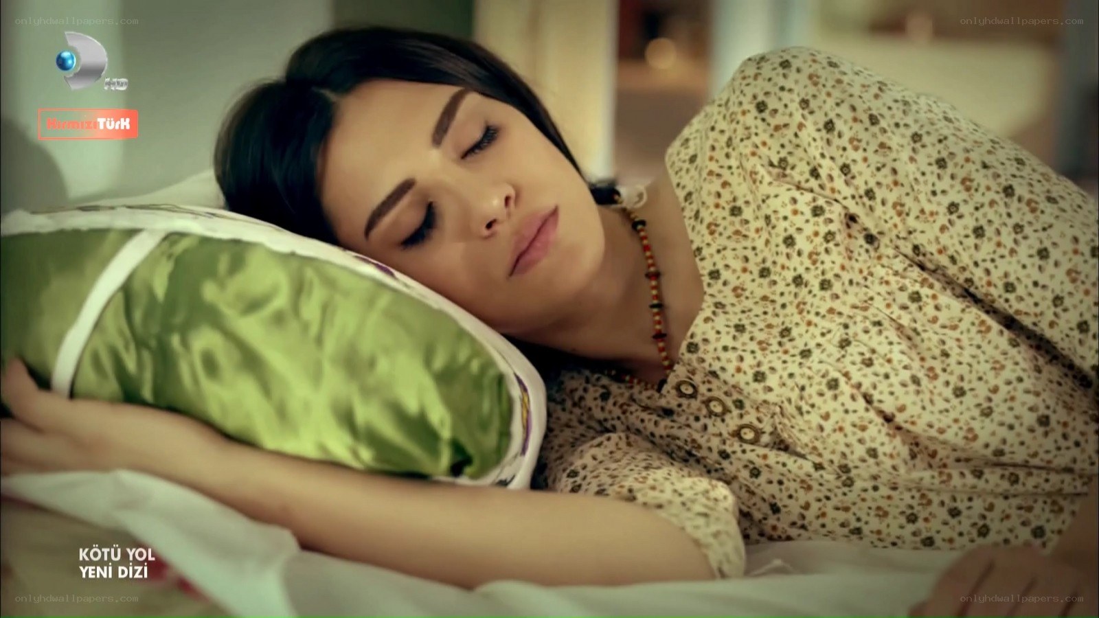 woman sleeping on bed