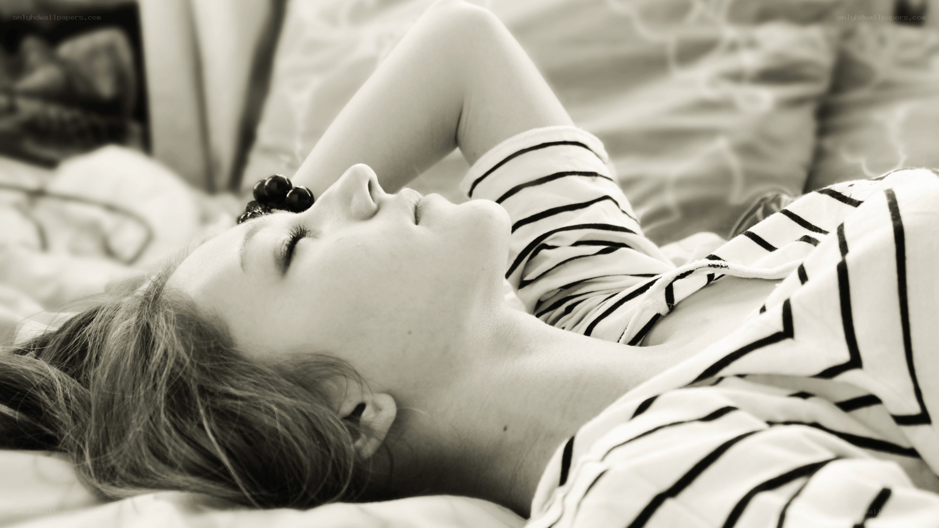woman sleeping on bed