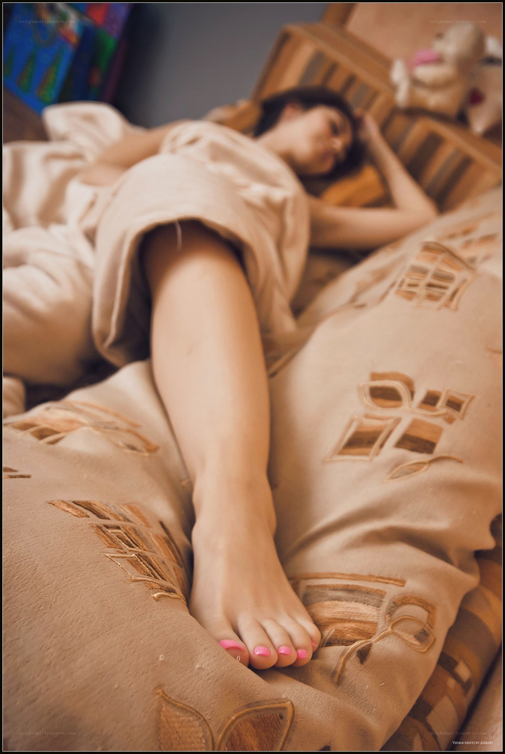 woman sleeping on bed