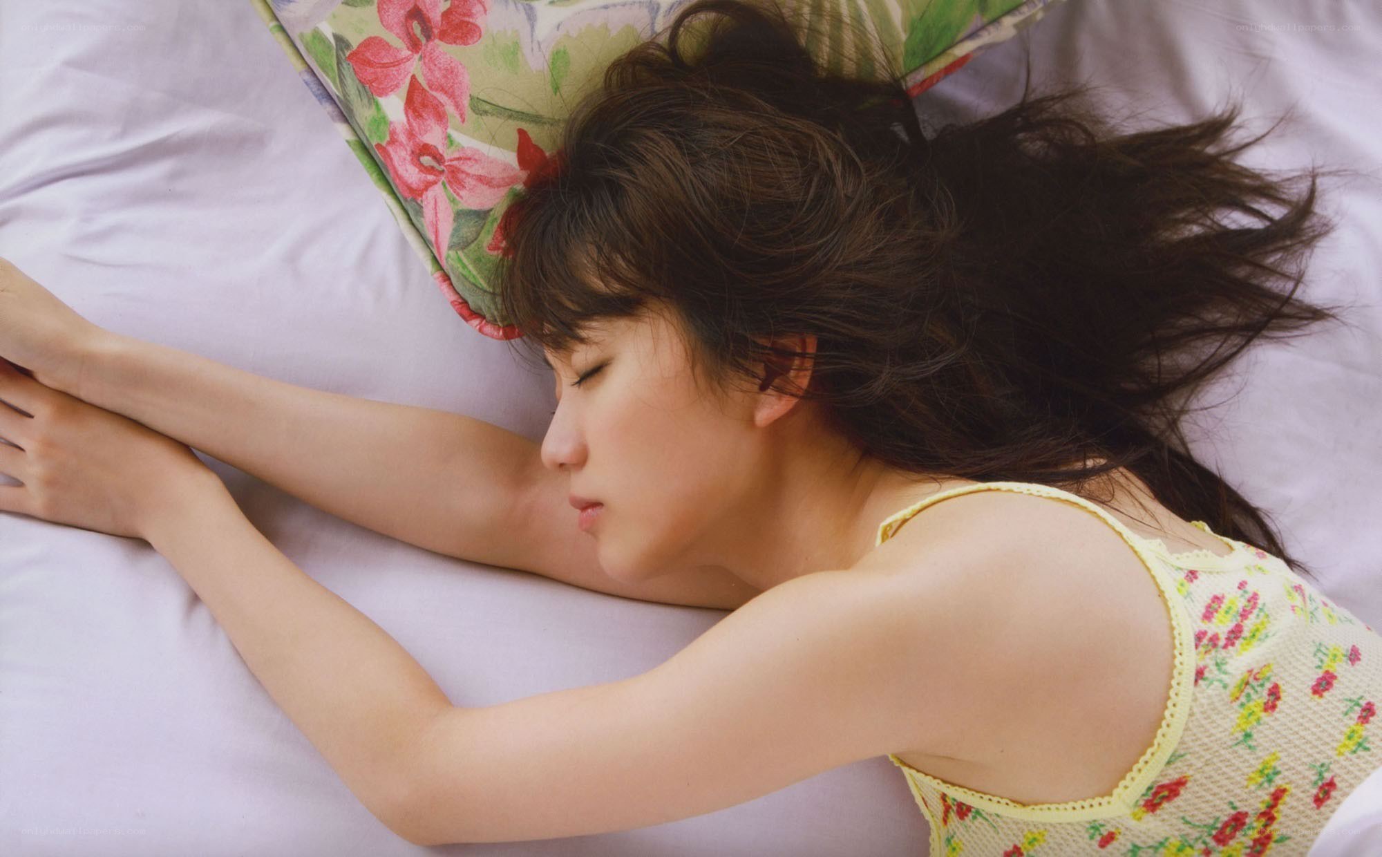 woman sleeping on bed