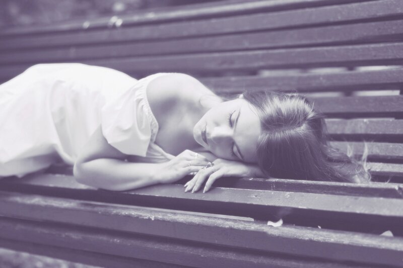Woman Sleeping on Bench — Purple