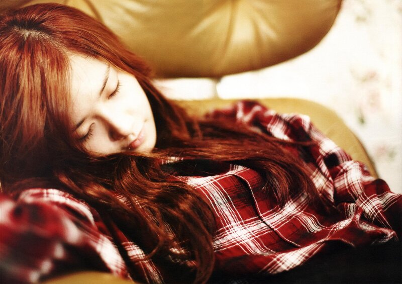 woman sleeping on couch