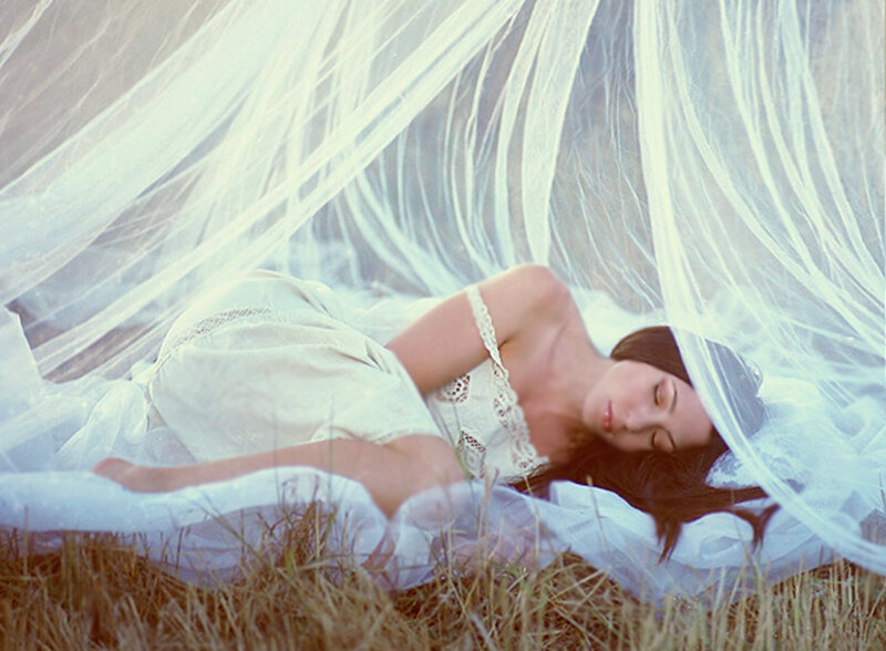 Woman Sleeping on Grass