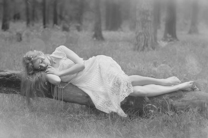 Woman Sleeping on Log — Black