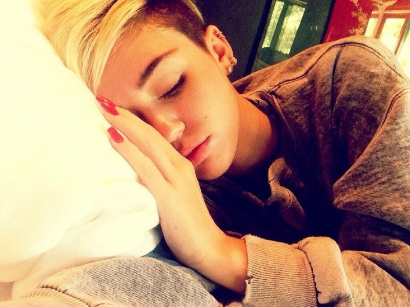 woman sleeping on pillow