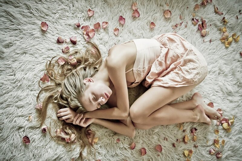 Woman Sleeping on Rug