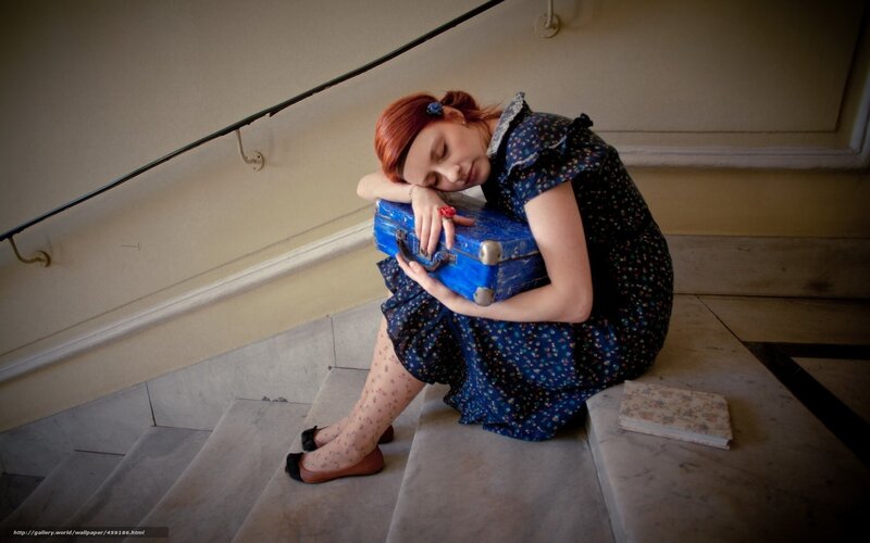 woman sleeping on stairs