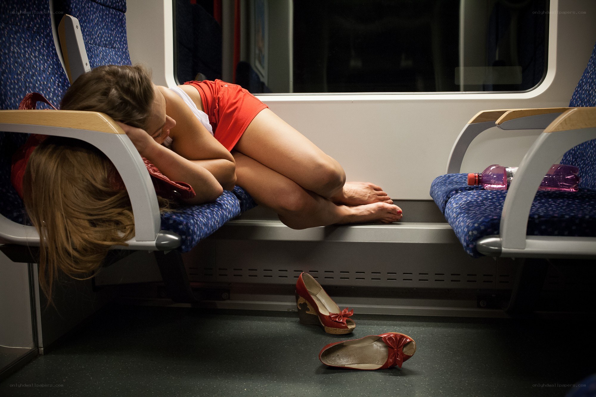 Woman sleeping on train