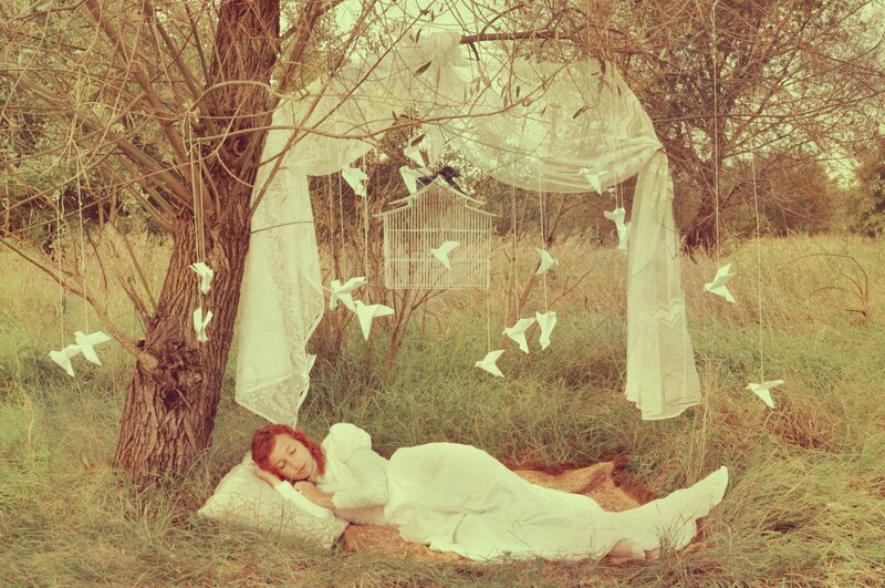 Woman Sleeping under Tree