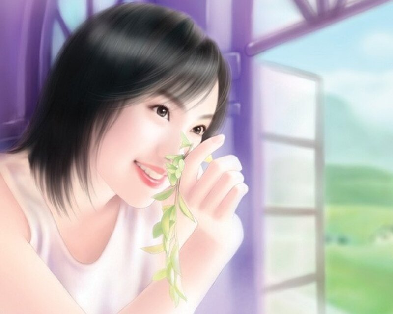 woman smelling a leaf