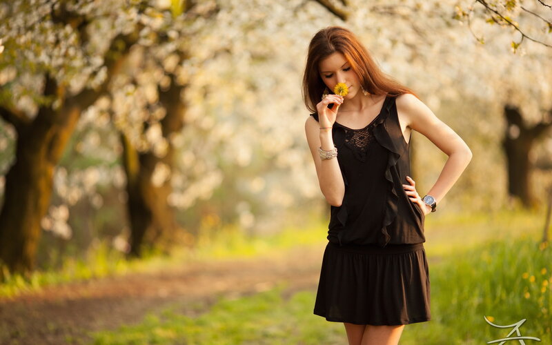 Woman Smelling Flower — Black, Serene