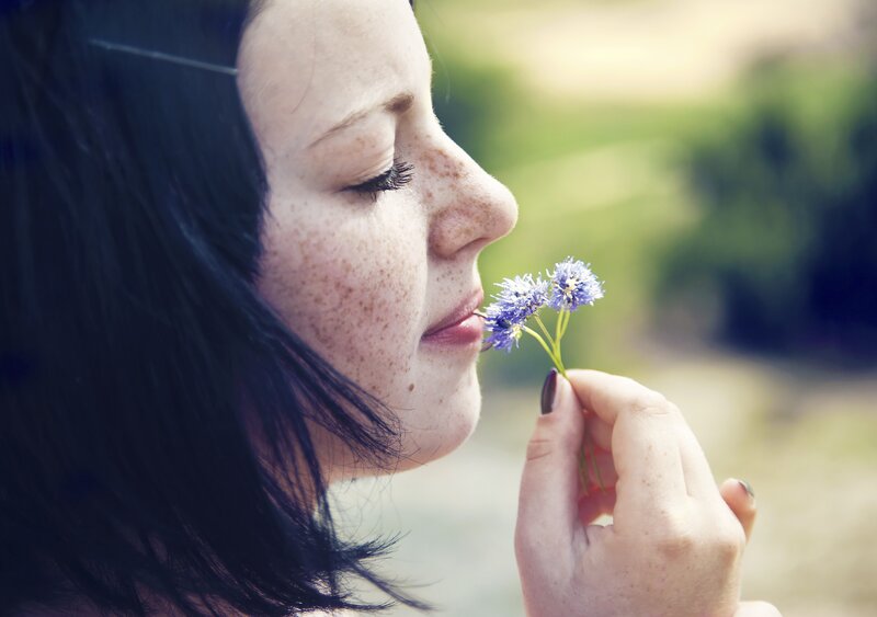 Woman Smelling Flower — Blue