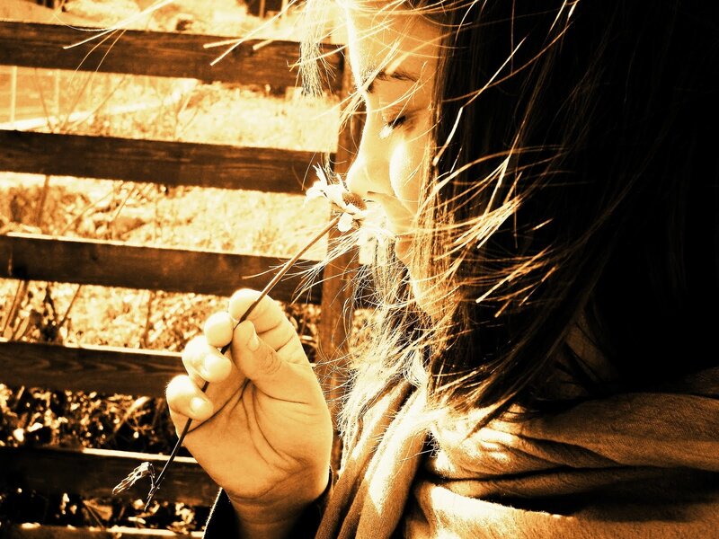 Woman Smelling Flower — Brown