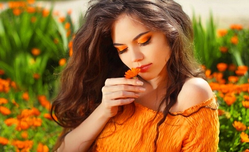 Woman Smelling Flower — Orange