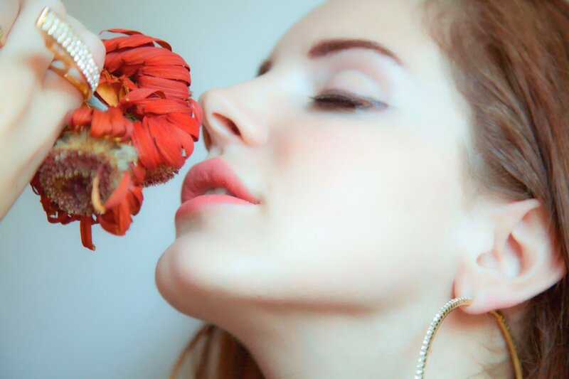 Woman Smelling Flower — Red, Serene