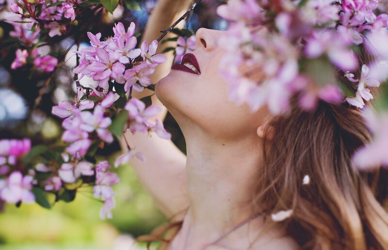Woman Smelling Flowers — Pink, Serene, Spring