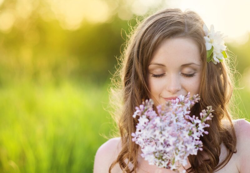 Woman Smelling Flowers — Purple