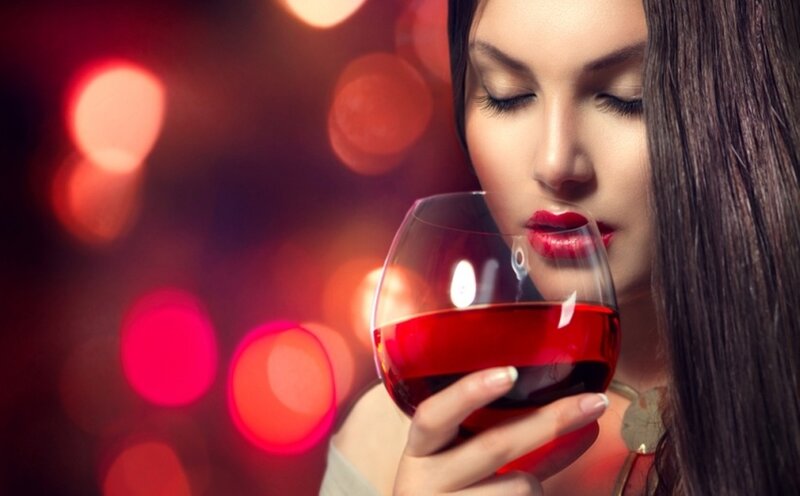 Woman Smelling Red Wine