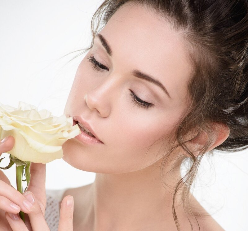 Woman Smelling Rose — White