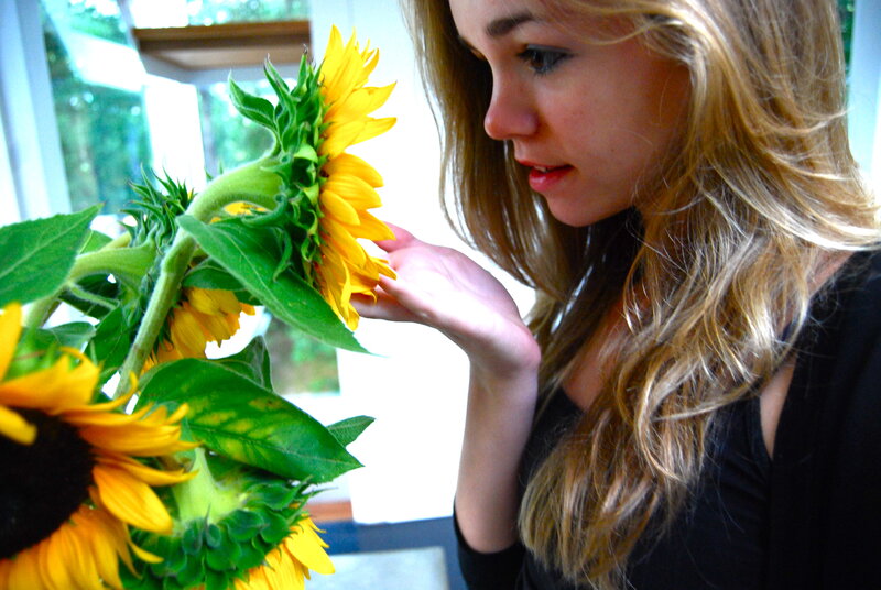 Woman Smelling Sunflower — Yellow, Calm
