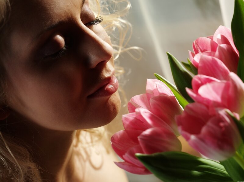 Woman Smelling Tulips — Pink