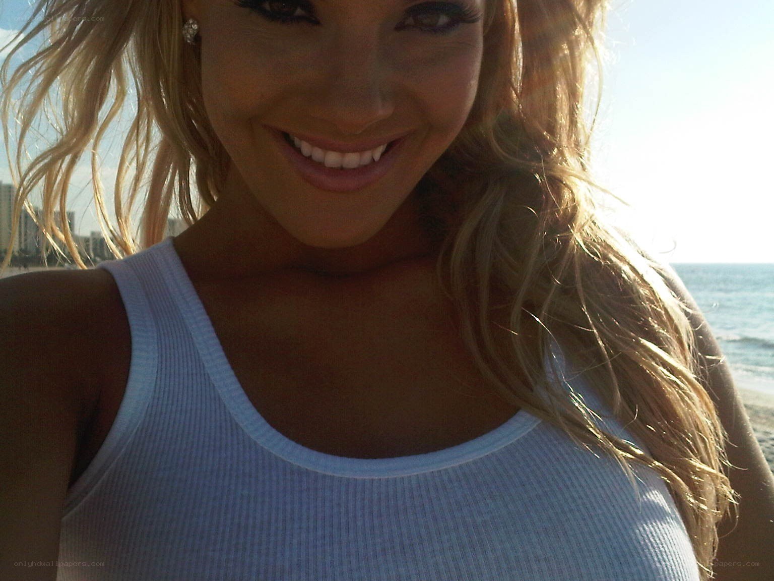 woman smiling at beach