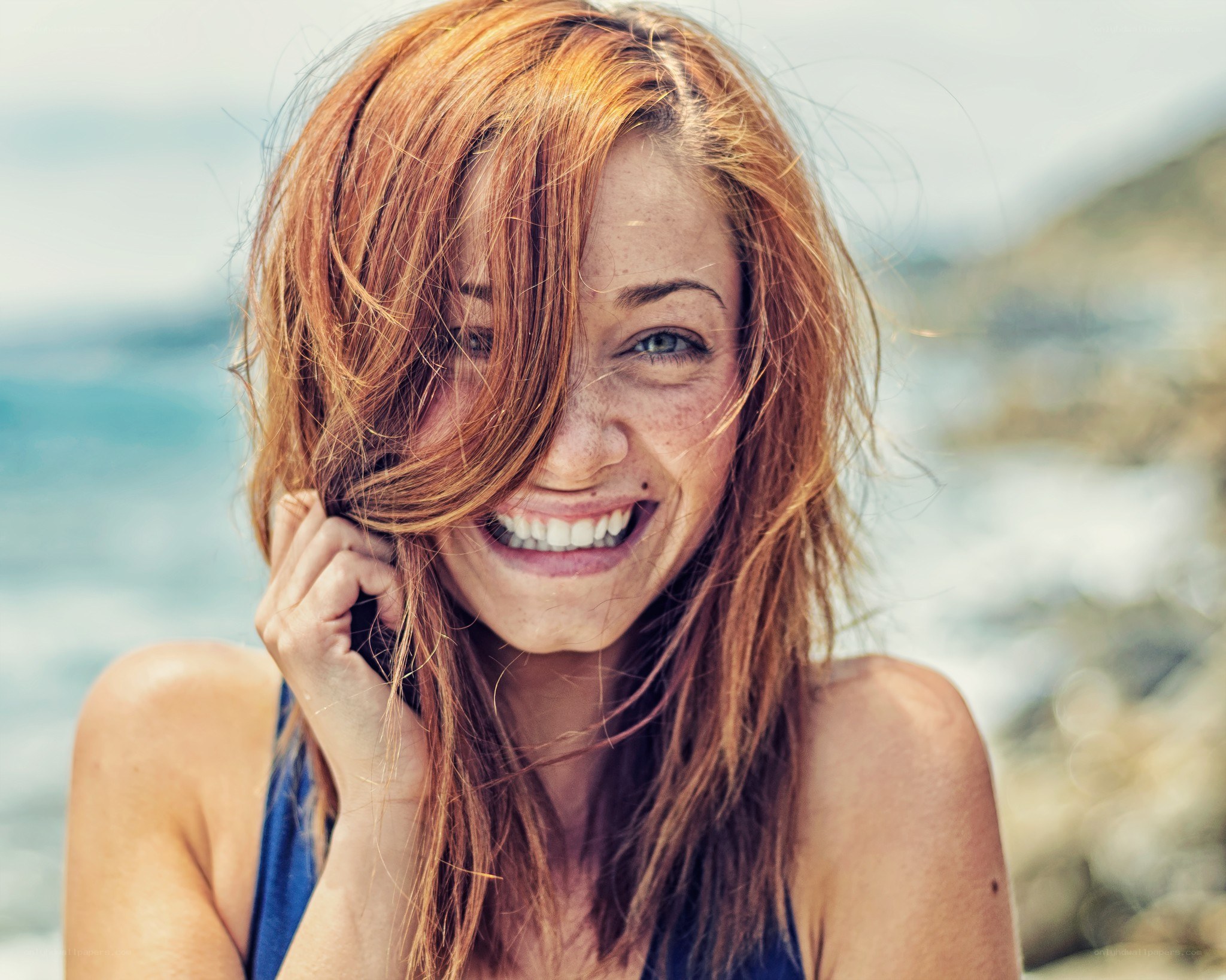 woman smiling at beach
