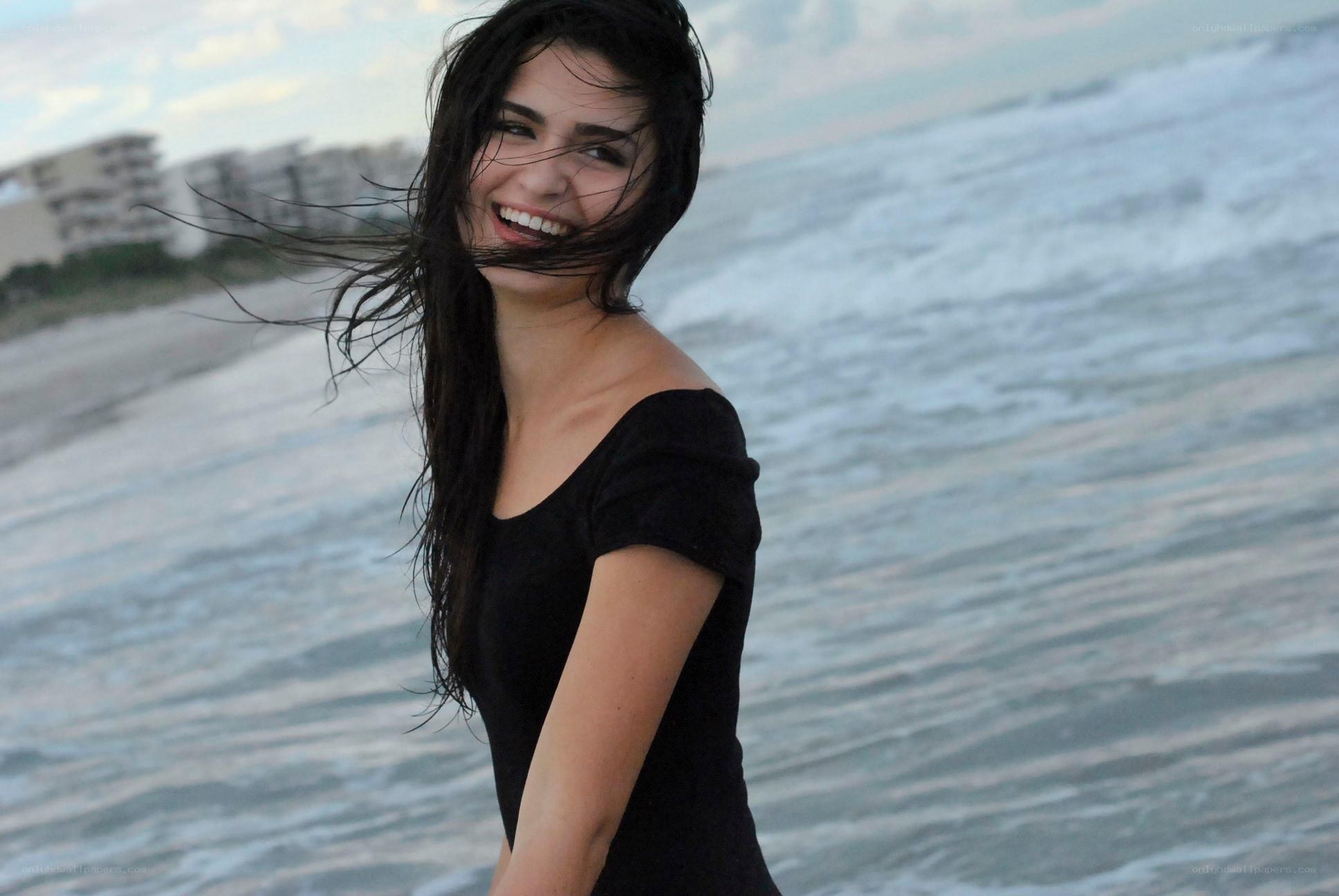 woman smiling at beach