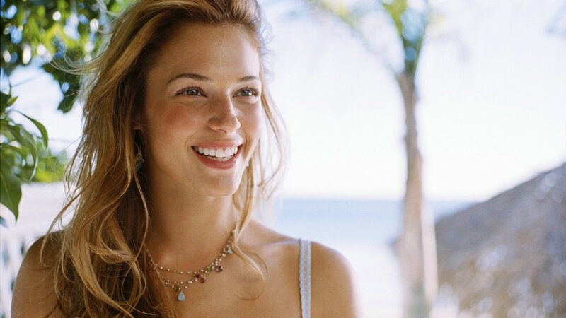 woman smiling at beach