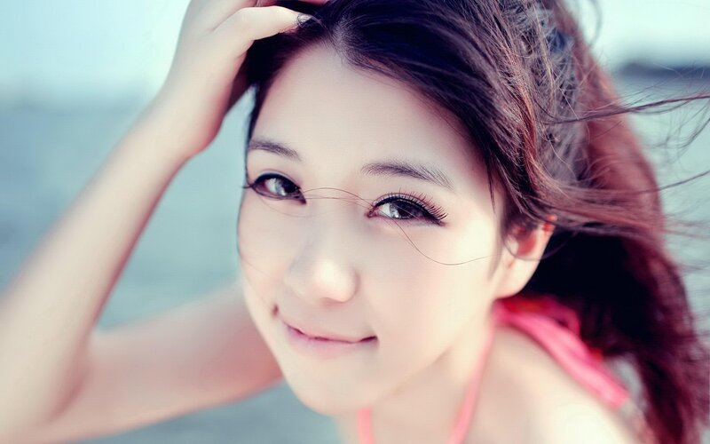 woman smiling at beach