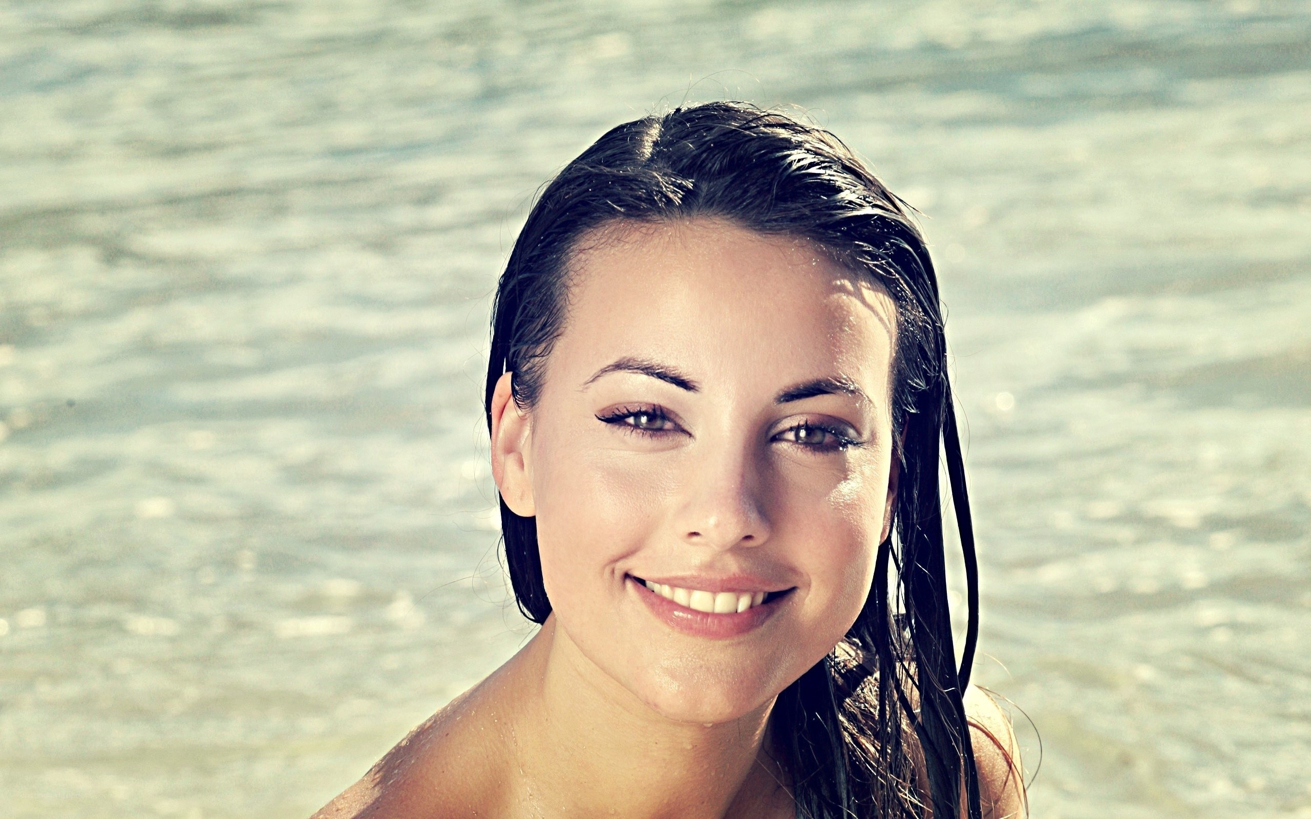 woman smiling at beach
