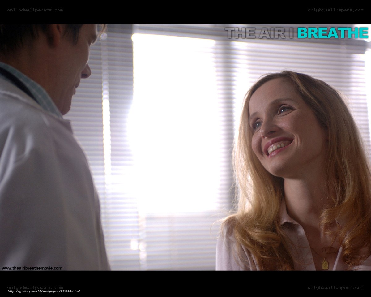 woman smiling at doctor