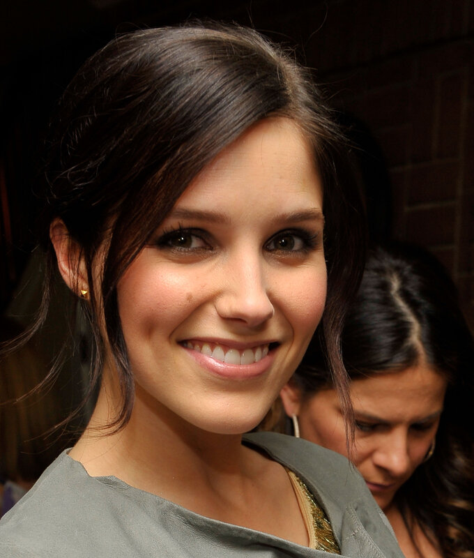 woman smiling at event