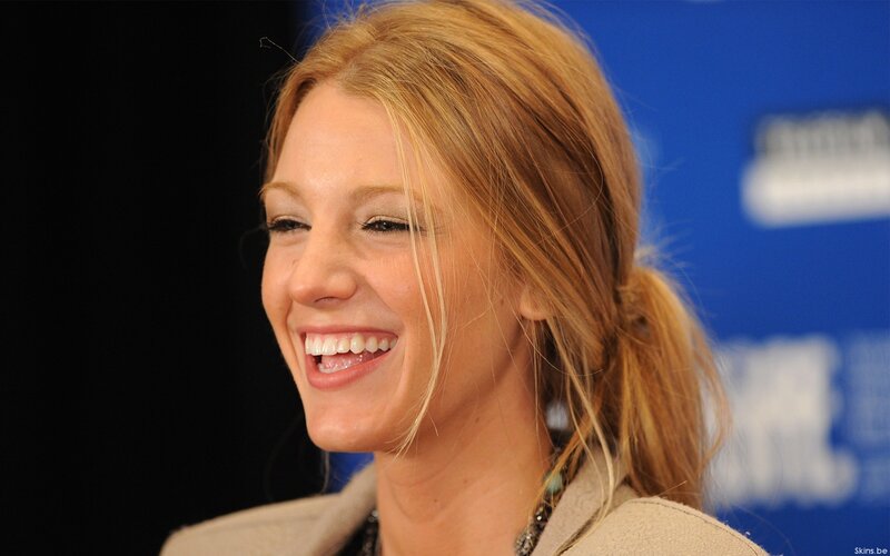 woman smiling at event