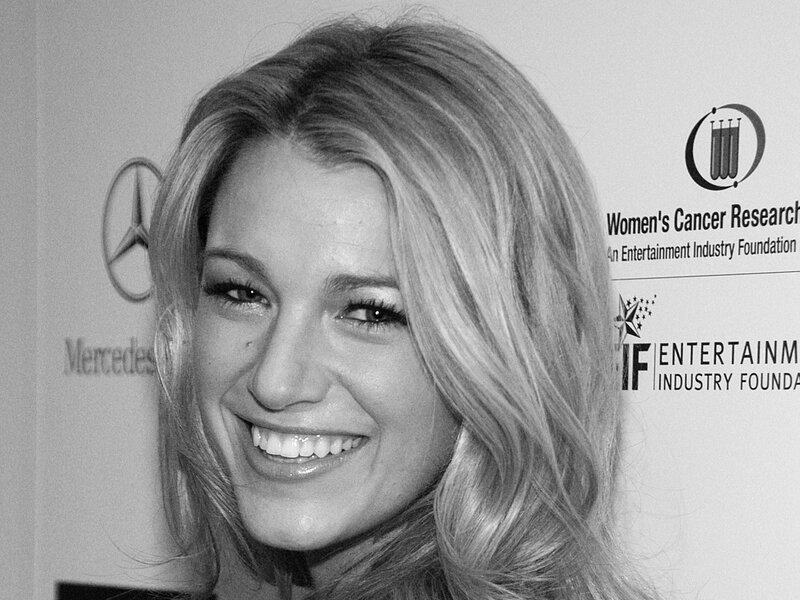 woman smiling at event