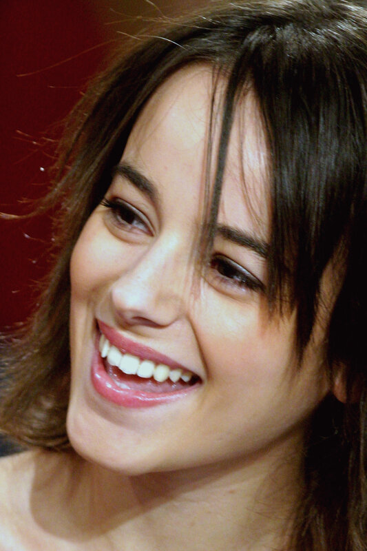 woman smiling at event